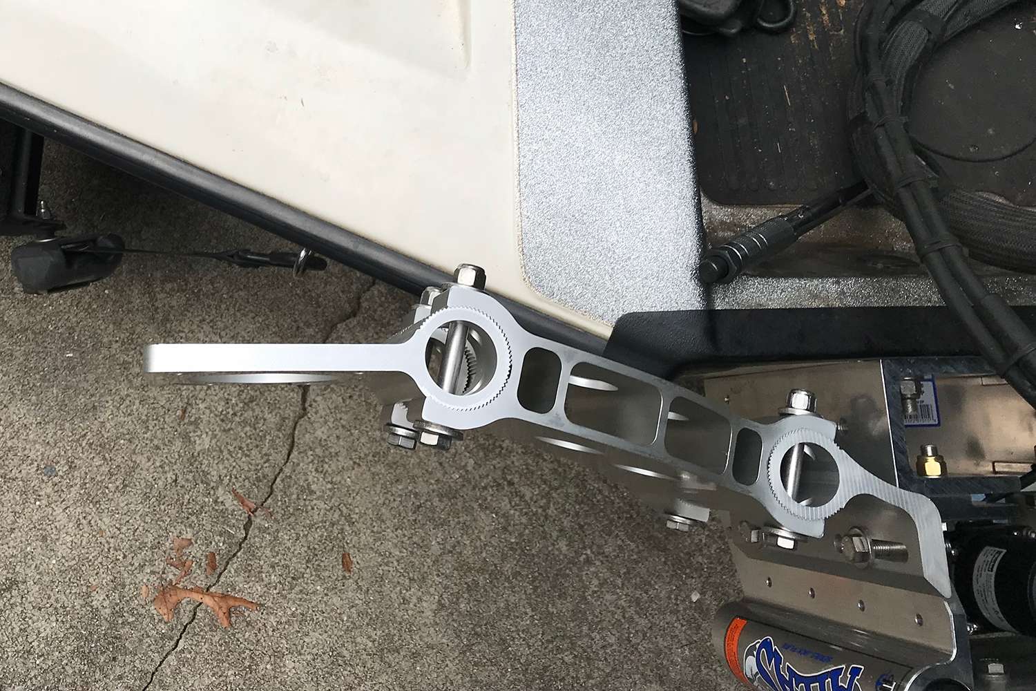 I've eye-balled this bracket being parallel with the transom. Essentially you want it to be square with the boat, parallel with the back and perpendicular with the gunnel. 