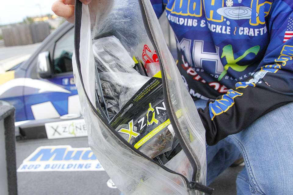 He stores his XZone soft plastics within Bass Mafia Money Bags as well as old fashioned gallon ziplock bags.