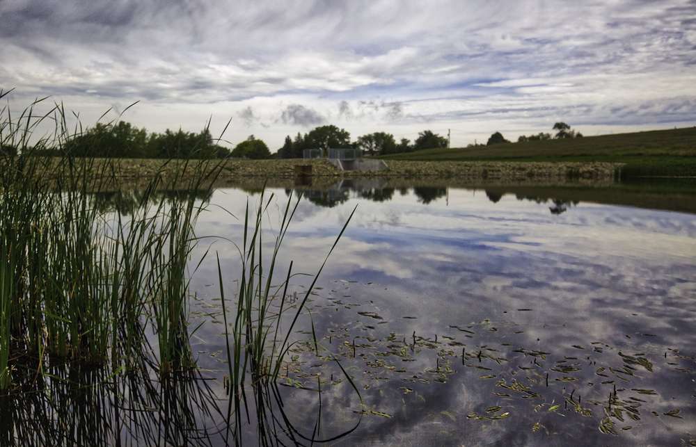 â¦got together and built a bass pond for the local kids to come and fish in. Troy told me there are a bunch of bass in there, he just for some reason wouldnât point out exactly where those fish were. Huh.