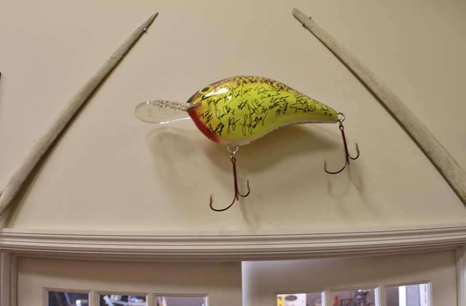 A pair of bills off swordfish add to the decoration of an enormous signed crankbait.