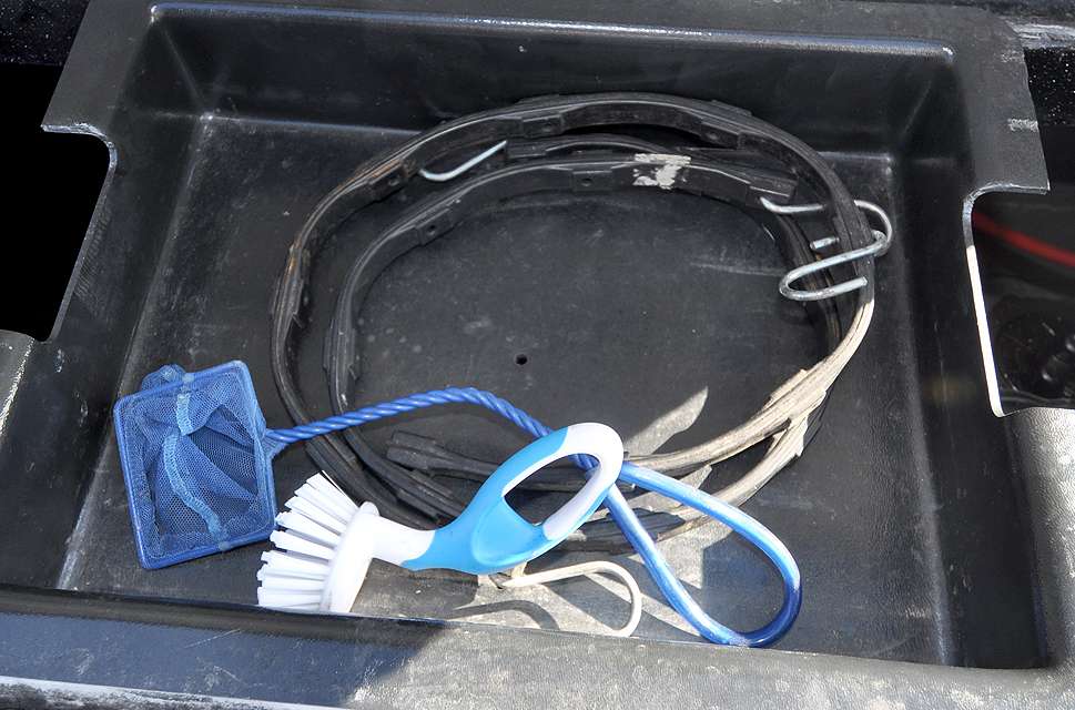 The other tray holds a small net and brush for cleaning the livewells, plus a bungee cord, because you never know when youâre going to need one.
