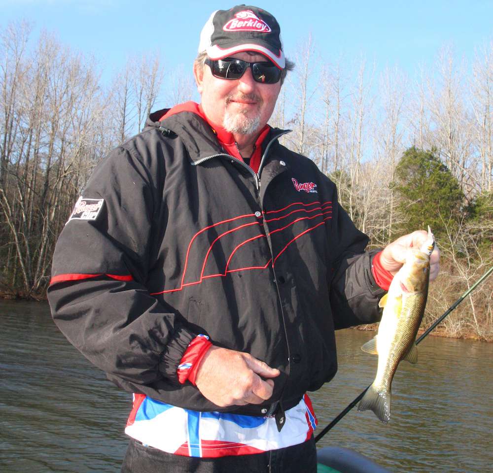 <b>5 HOURS LEFT</b><br>
<b>9:09 a.m.</b> Fritts bags his first keeper of the day, 1 pound, 1 ounce, from the side of a main-lake pocket on the Bad Shad. âHe was out in front of a submerged tree branch.â <br>
<b>9:11 a.m.</b> Fritts continues fishing the Bad Shad. Rather than crank the lure straight in, he makes a long cast, then moves the bait by pulling his rod back fairly slowly rather than by turning the reel handle. He then lowers the rod to the starting position while reeling in slack line, and repeats. âIn cold water, baitfish tend to dart or swim a short distance, stop, swim a little more, then stop again. This retrieve replicates their tentative, erratic movements.â <br>
