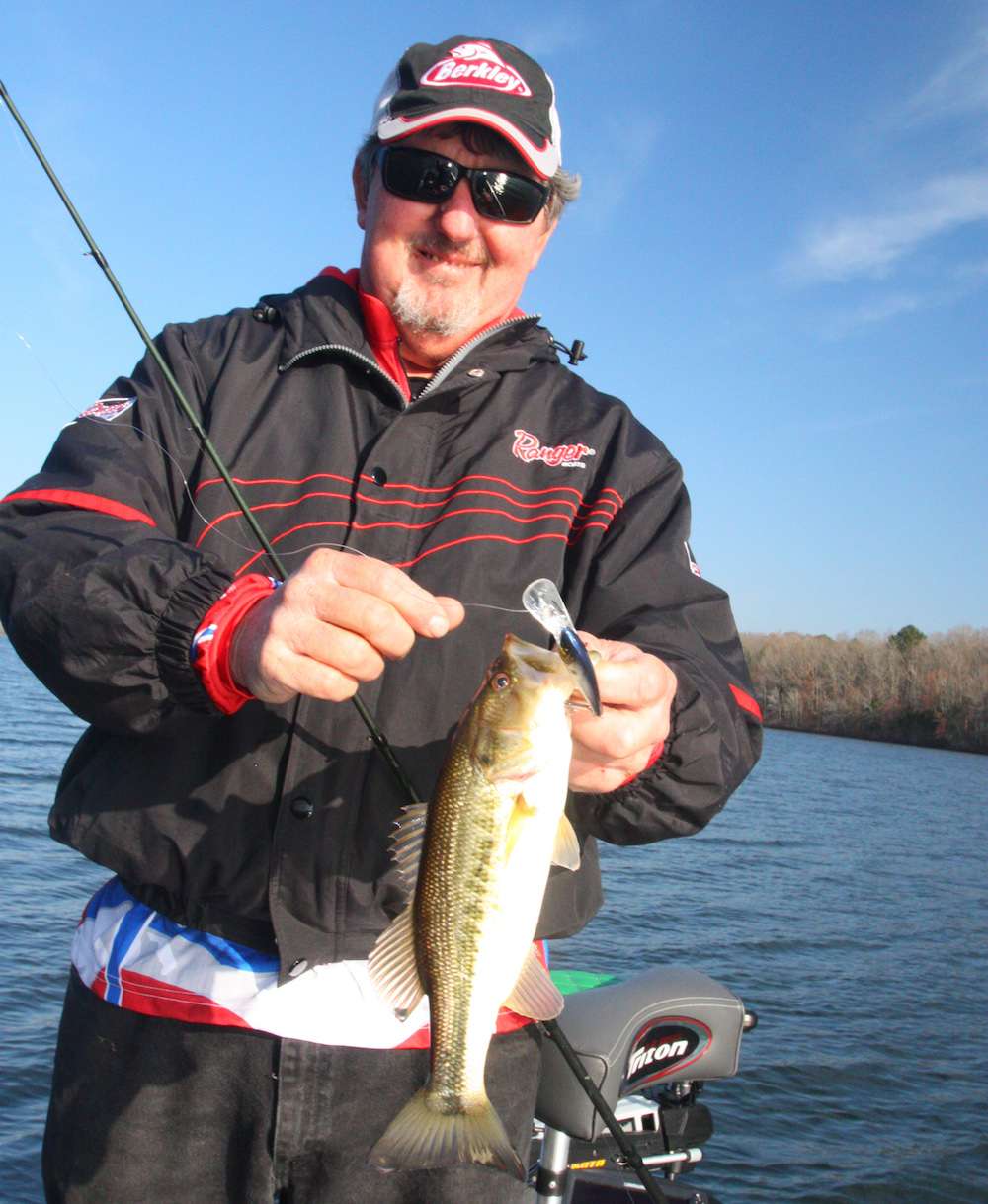 <b>9:14 a.m.</b> Fritts bags his second keeper, 1 pound, 4 ounces, on the Bad Shad. âThat fish was holding right where a 12-foot channel swings in against the bank.â <br>
