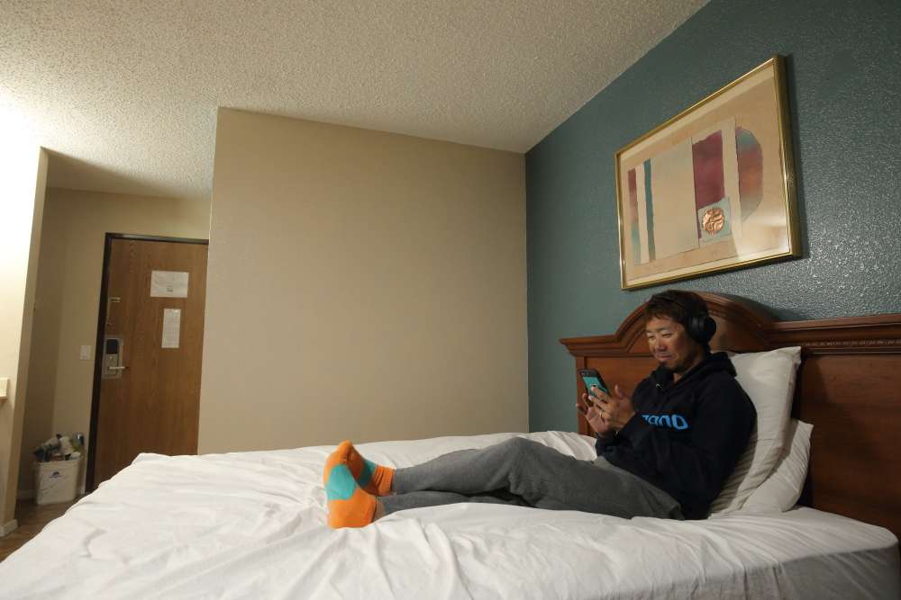 Follow along with B.A.S.S. photographer Seigo Saito as he visits nine Opens anglers from Japan to see how they spent the cancellation day.  <br><br> First up, Ken Iyobe relaxing in his hotel room. He is the CEO and designer for his company, 10TFU.  He takes care of his business while he's back in Japan between Bassmaster Open tournaments, so he doesnât have to worry about it while he fishes for his dream: to re-qualify for the Elites and compete in the GEICO Bassmaster Classic. Here he listens to his favorite music and checks out social network comments from fans.