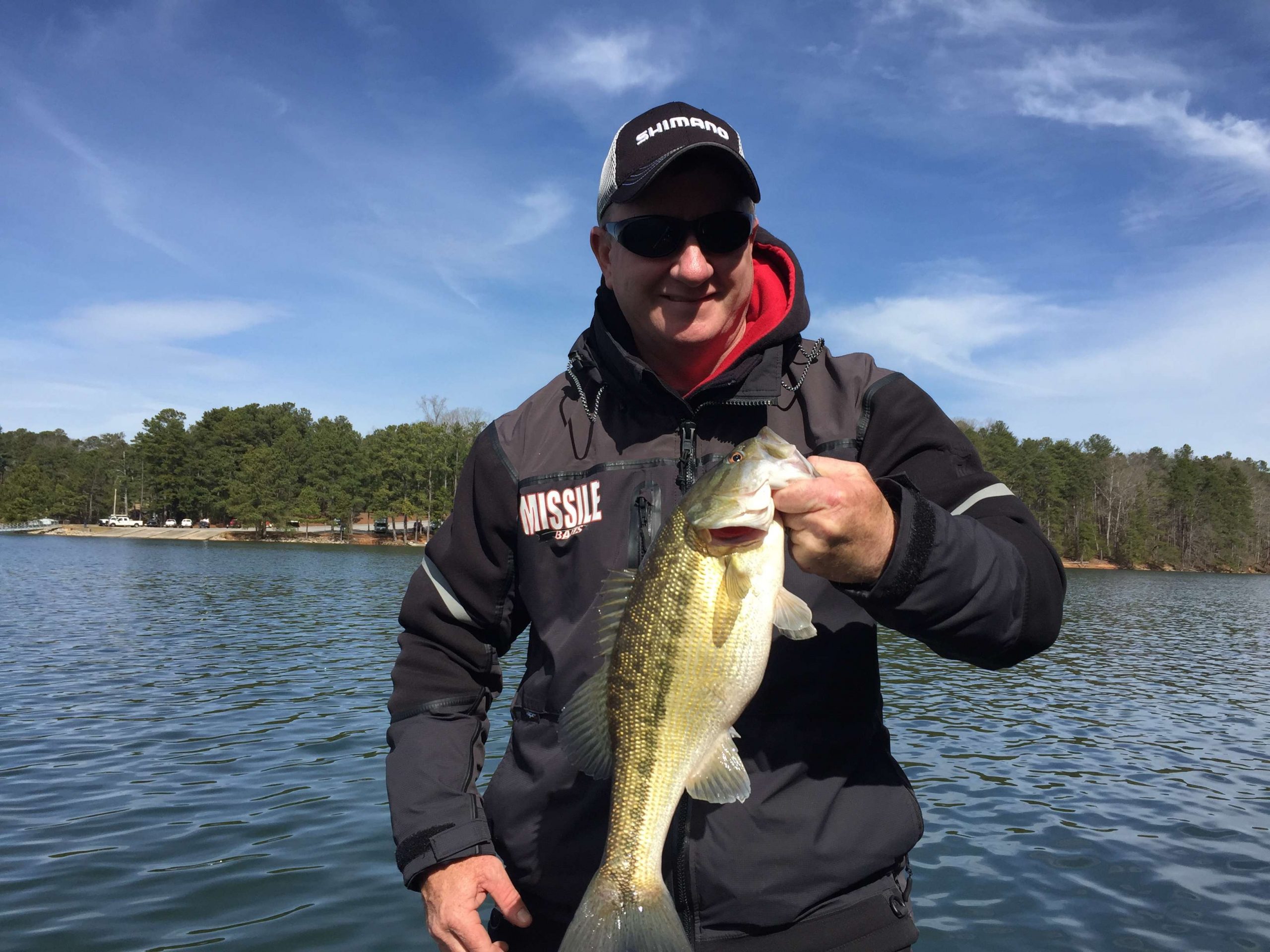 Ed Loughran with his third, a spotted bass at 2 1/2 pounds.