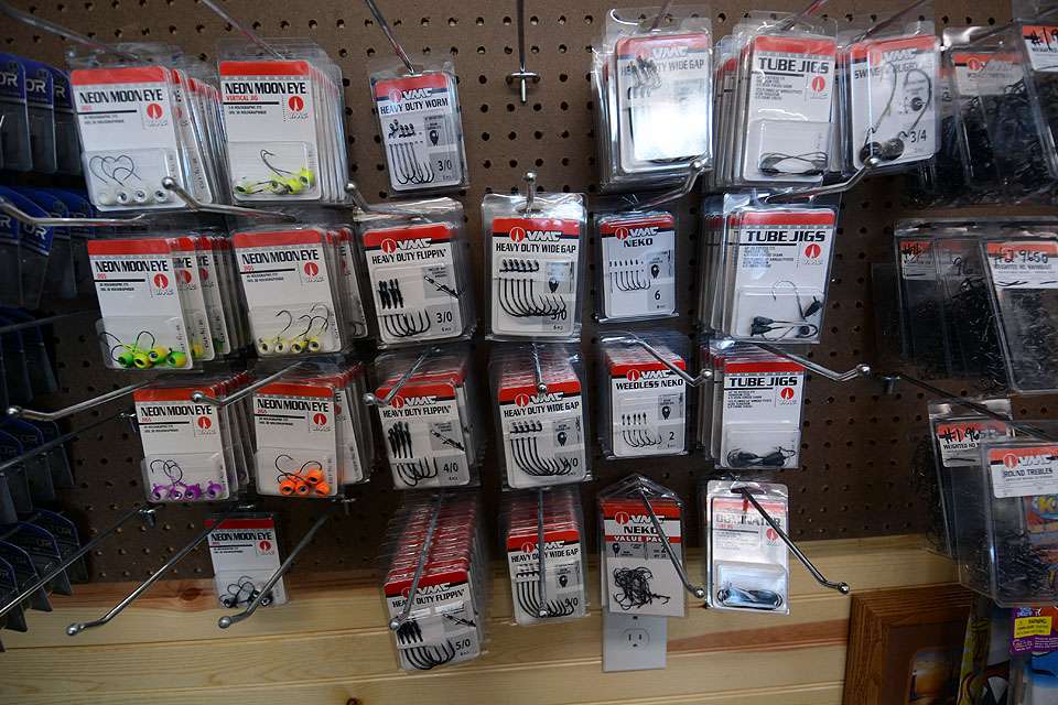 Also on the wall is a variety of VMC hooks and jig heads. Those cover rigging needs for the entire water column. Mooneye jig heads for finesse, heavy duty hooks for shallow-water power fishing, and Neko rigs and tube jigs for shallow and deep applications.  