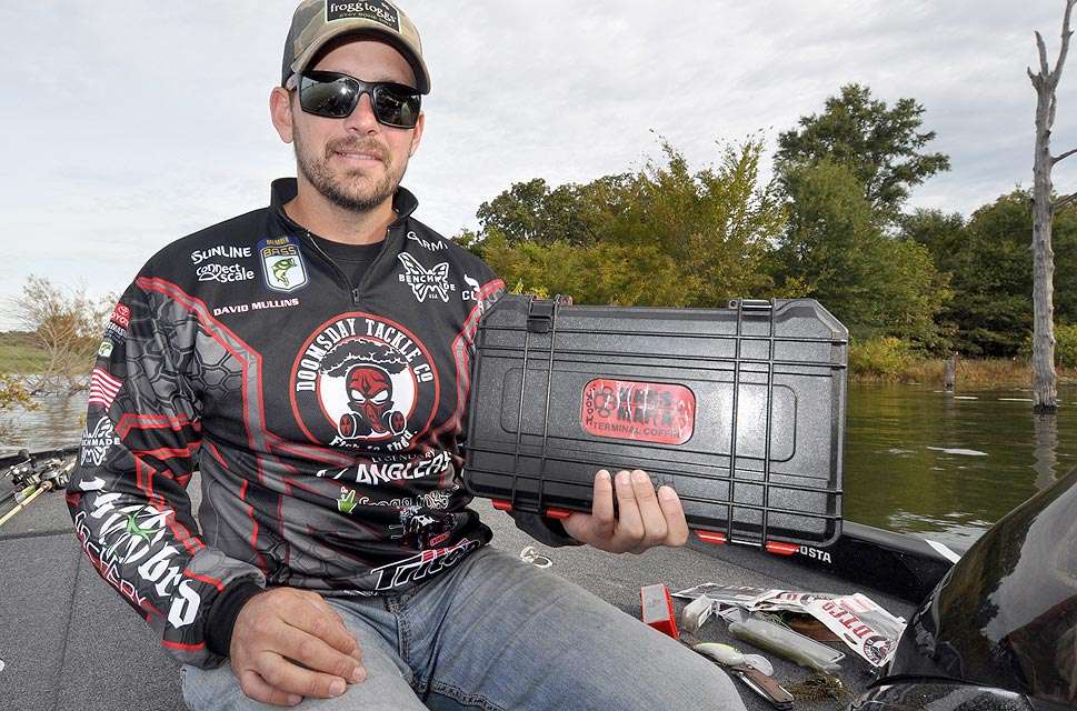Bassmaster Elite Series pro David Mullins with the empty Bass Mafia tacklebox he is about to fill with lures for beginning bass anglers.