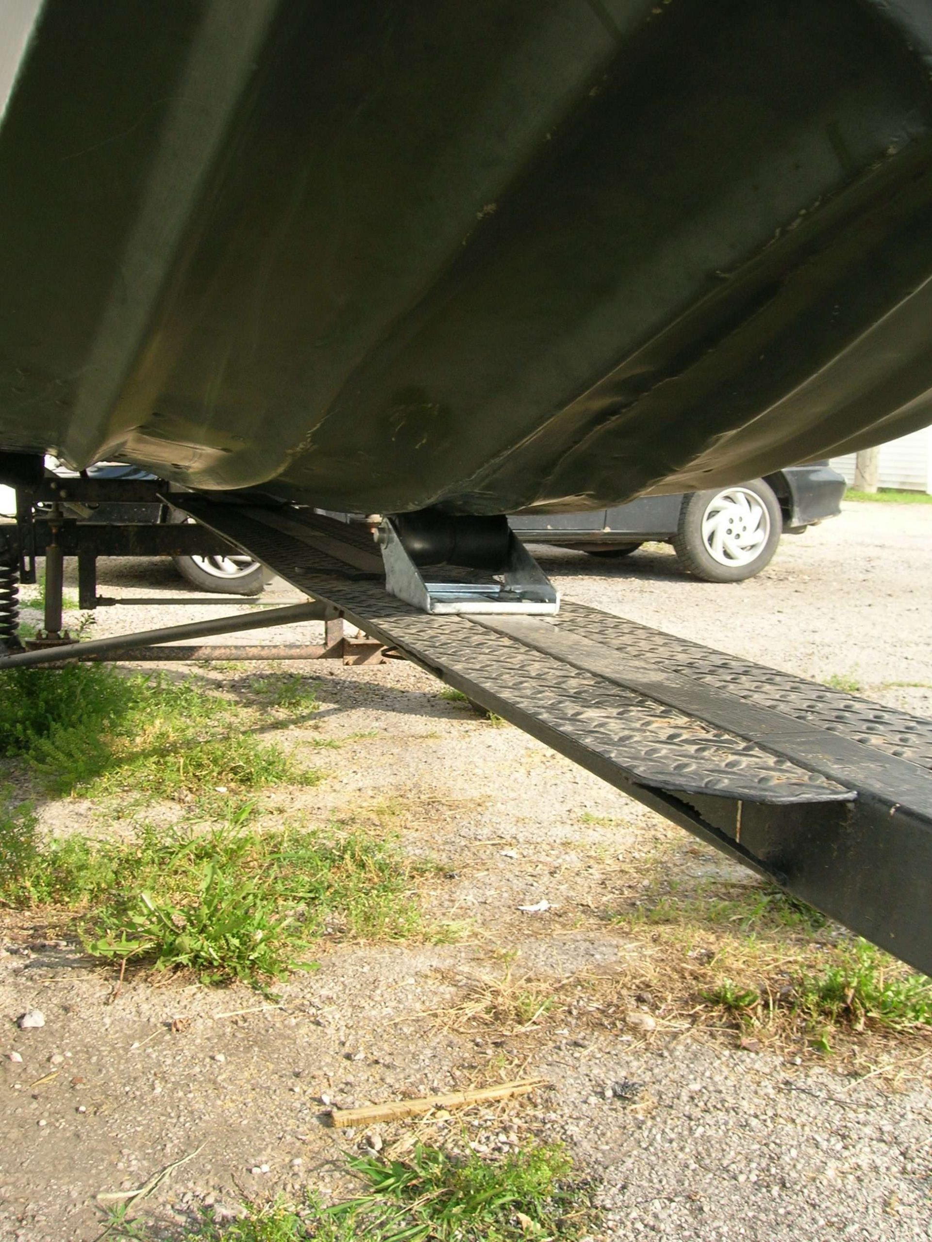 Now, let's get into some modifications: I replaced that roller at the first boat ramp I visited. I think the front of the boat had sustained some damage at some point in its life, and was welded. I couldn't be sure, but it was a $200 boat. It never leaked a drop.