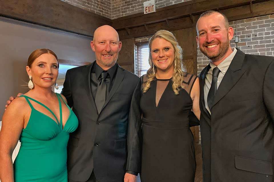 The anglers and their wives dress to the nines for Night of Champions, where B.A.S.S. recognizes all of its champions from the previous year. Here DeFoe, wife, Jennie, and Wesley and Stephanie Strader, also from Tennessee, pose.