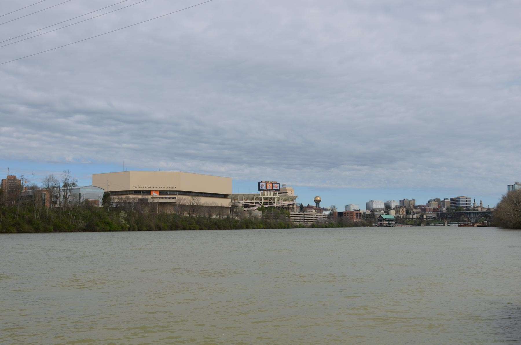 The University of Tennessee campus skyline is a compelling sight along the Tennessee River shoreline

