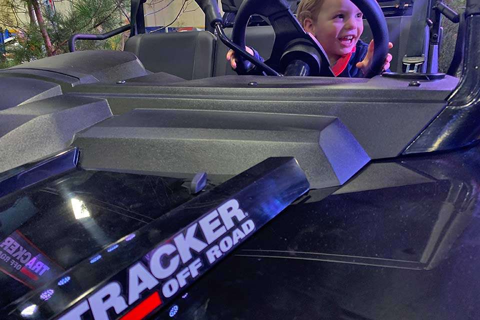 Everyone gets excited behind the wheel of a Tracker ATV, including 2-year-old Maggie Bobbers of Knoxville. She was just too cute, and too happy, not to photograph.