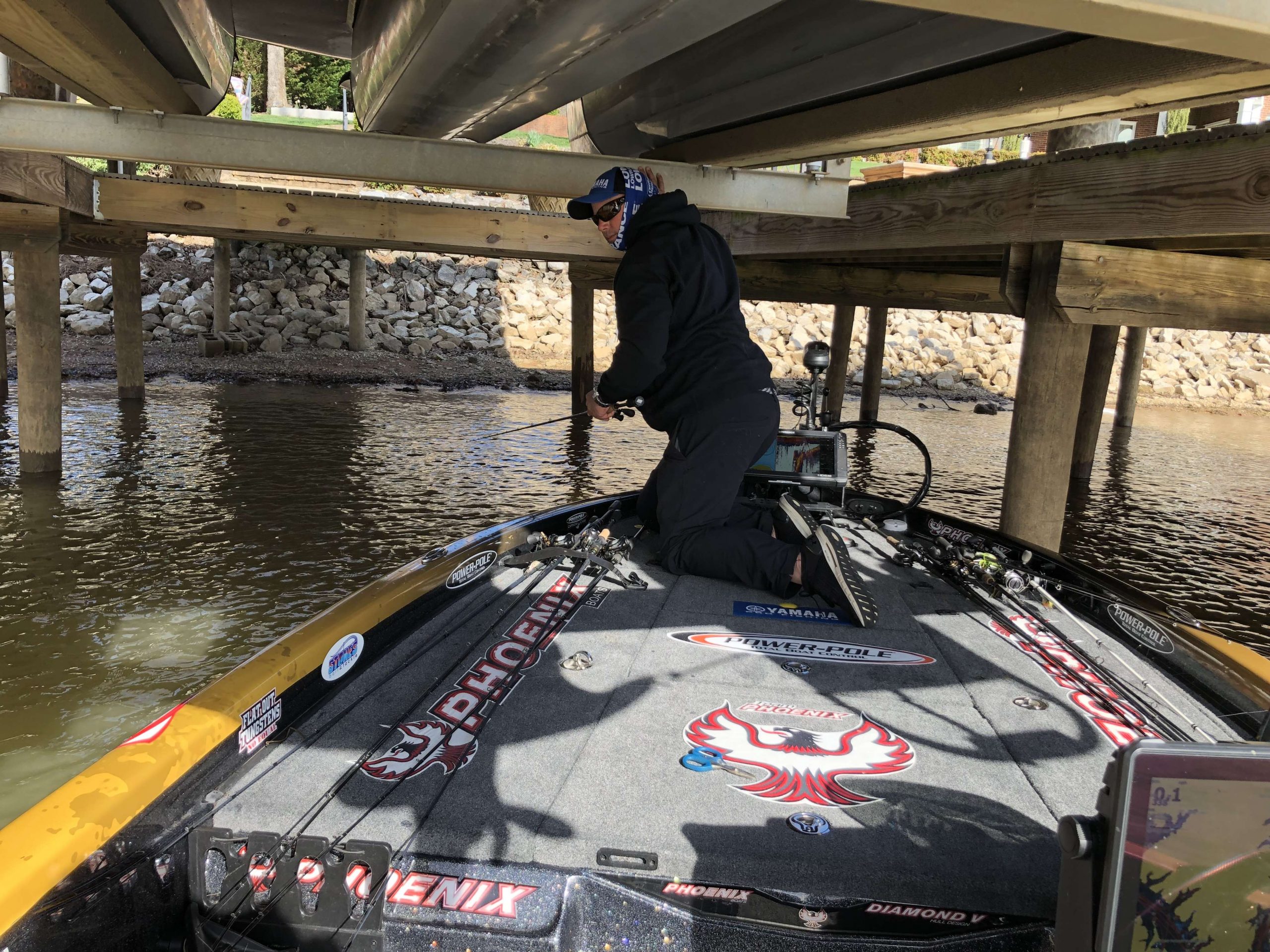 Bobby Lane is getting bites this morning, and has put no less than six short fish in the box.  Currently he has two keepers with hopes of culling both of them.  Once he retrieved his crank bait, he went ahead and hit all the angles under this dock.
