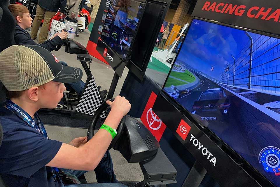 Aiden Barber, 14, of Roseville, Ga., takes a spin at the Toyota Racing Challenge. Toyota has kept Bassmaster anglers rolling for years.