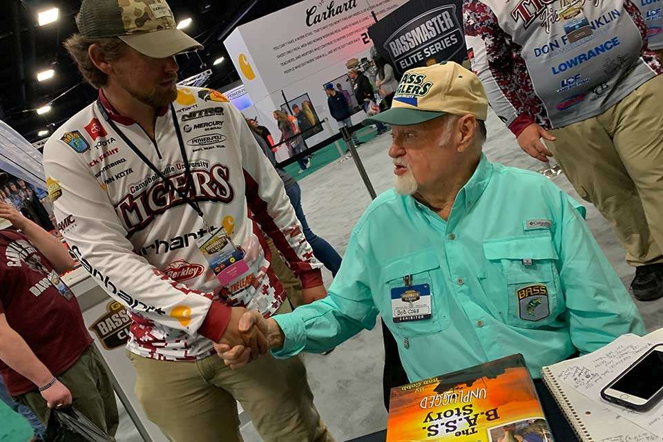 Out in front of the LIVE set, Bob Cobb meets Carhartt Classic qualifier Nick Ratliff of Elizabethtown, Ky., who wished he would have made Campbellsville University prouder by finishing better than 41st. Cobb was promoting his new book, <em>The B.A.S.S. Story Unplugged</em>.