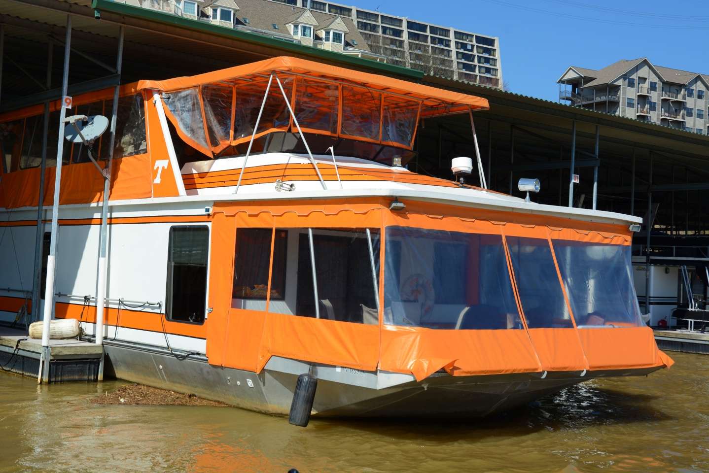 On any given home game Saturday, the Vol Navy is a fleet of boats that on average number from 150 to 200 boats, mostly houseboats like this, yachts and runabouts. The Vol Navy is part of the unique atmosphere of the football games. 
