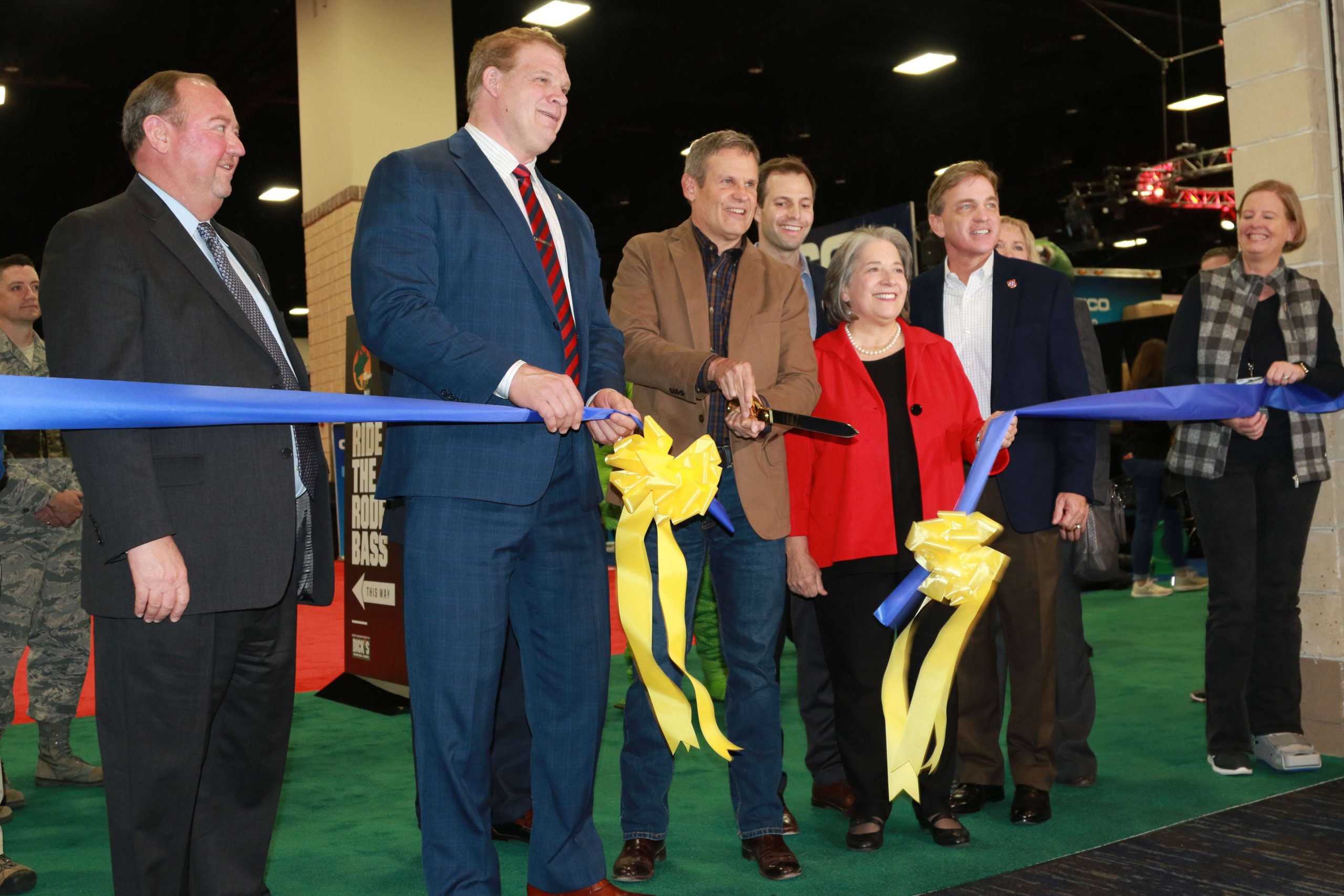With one swift cut, Tennessee Governor Bill Lee officially opens the Bassmaster Classic Expo