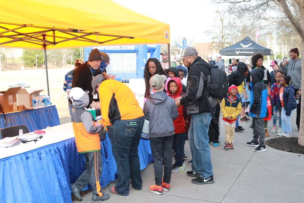 Families line up to register for a broad array of fun events.
