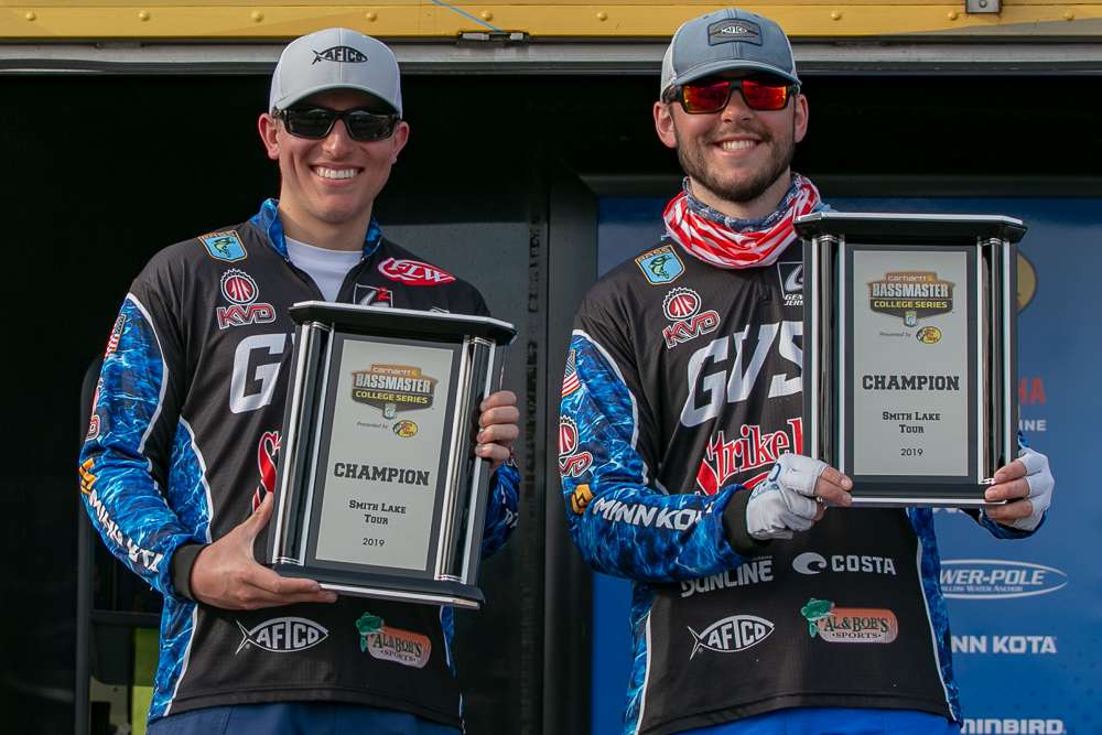 Murphy and Gunn hold up their trophies, winners at Smith Lake. 