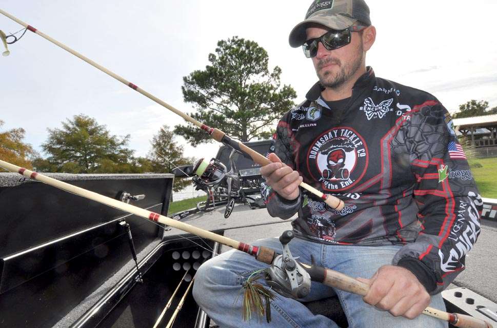 Mullins holds two of his workhorse rods. One is a 7-foot, medium-light Doomsday 47 spinning rod with a Shimano Stradic 3000 reel filled with 12-pound Sunline FX Braid with a 7-pound Sunline Sniper Fluorocarbon leader. The other is a Doomsday 7-foot, 8-inch, heavy-action flipping rod sporting a Shimano Metanium MGL reel filled with 20-pound Sunline Shooter Fluorocarbon.

