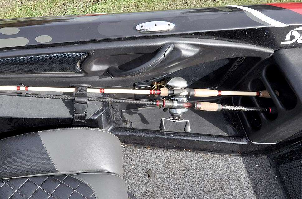 Rod holders with a strap keep the passengerâs rods from tangling and bouncing out of the boat.
