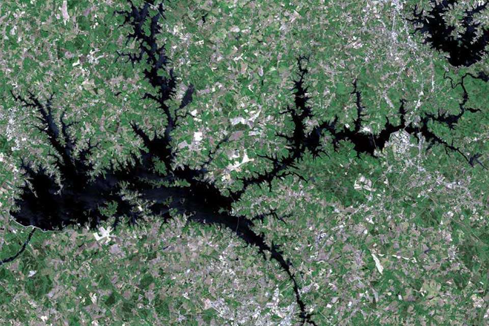 In this NASA satellite with north to the right, Hartwell extends 49 miles up the Tugaloo River and 45 miles up the Seneca River. It has 962 miles of shoreline.