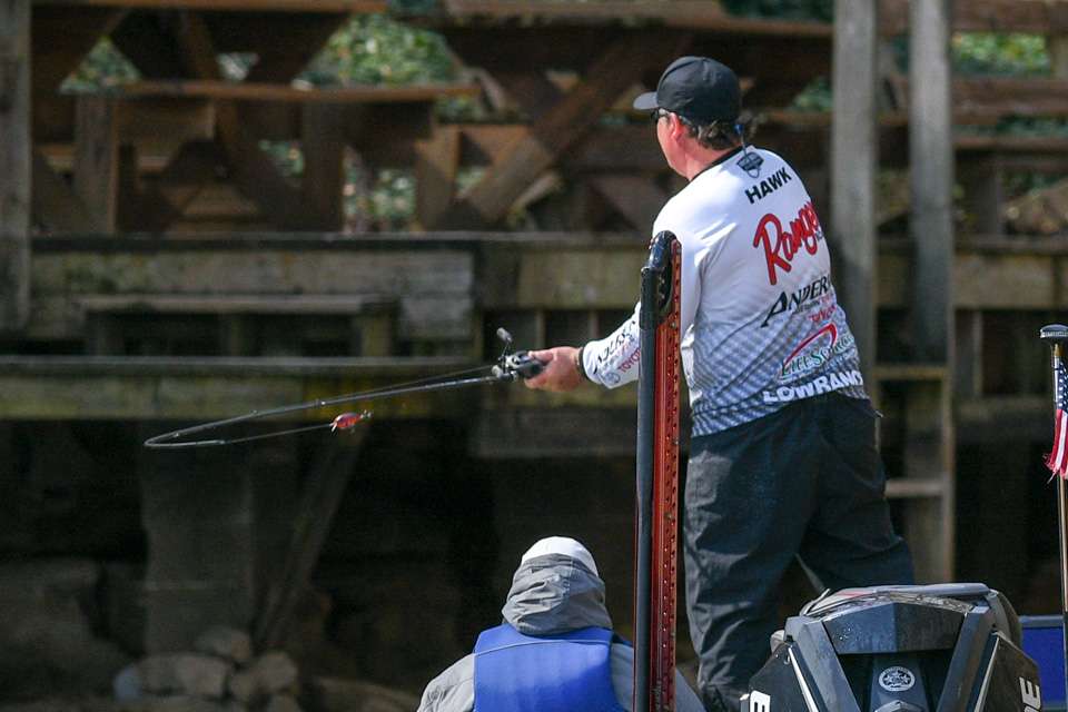 I probably shoot 1,000 casting shots a day (much to the chagrin of veteran shooter James Overstreet, who often has to weed through them). This photo gives a great perspective of whatâs happening, from the bent rod and crank bait to the anglerâs jersey to the marshal in the passenger seat. Itâs a prelude to the real action.