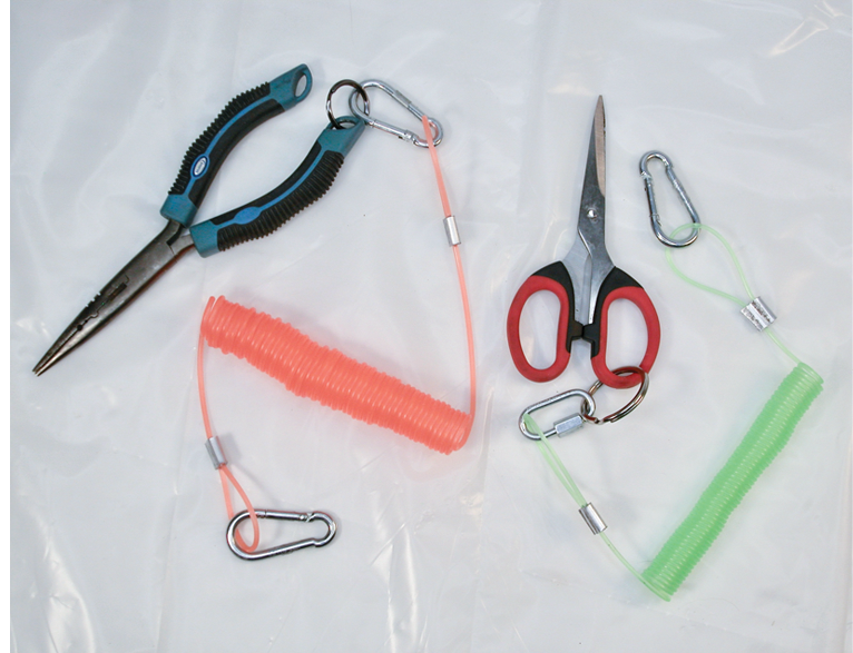 Make end loops: Pound your cable clamps tight with a hammer and then trim the tag ends. Add carabiners to attach your pliers, scissors, hook file, etc. 
