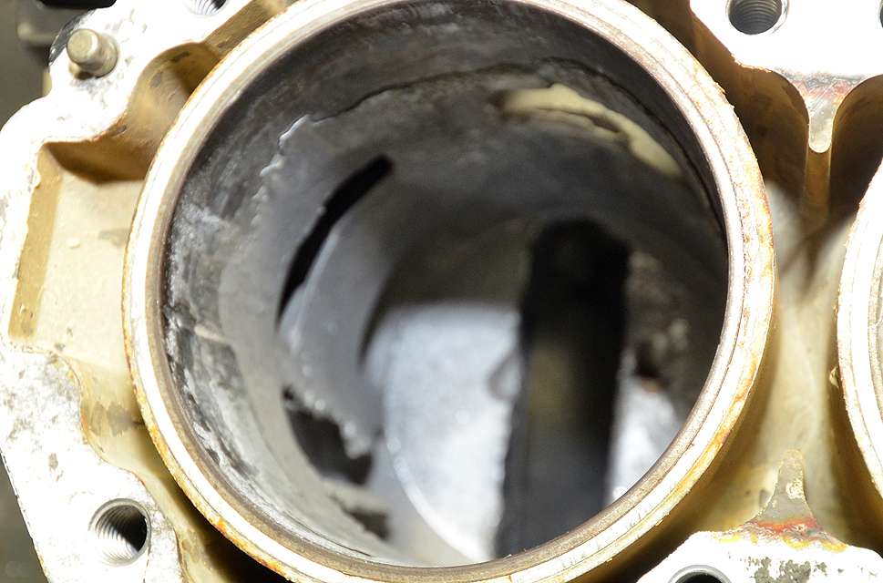 I made the four-hour drive to Blackbird Motors from my Ohio home on a cold, drizzly, late November morning. After they removed my block, I could see the damaged piston and peak into the cylinder from whence the blown piston came. The cylinder wall is shredded and some pieces have broken off.