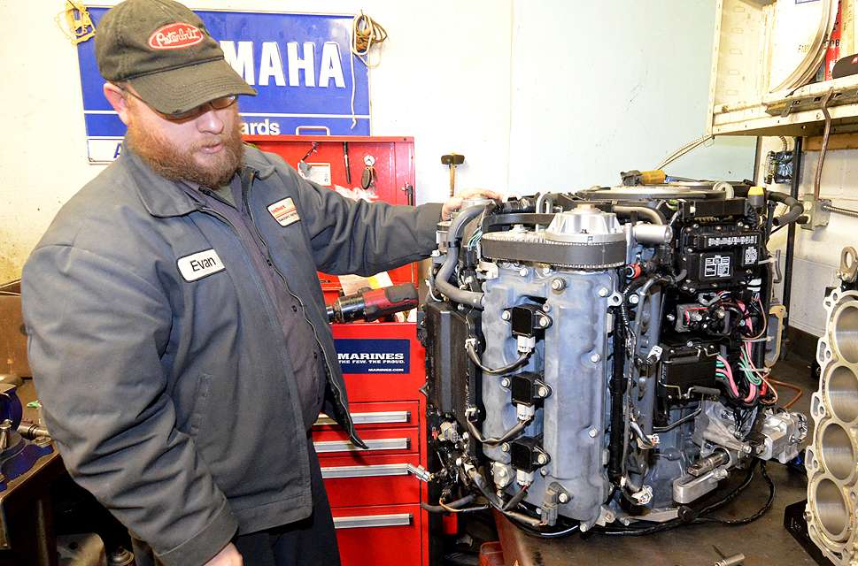 Evan Nolte is in charge of assembling Mercury Verado engines.