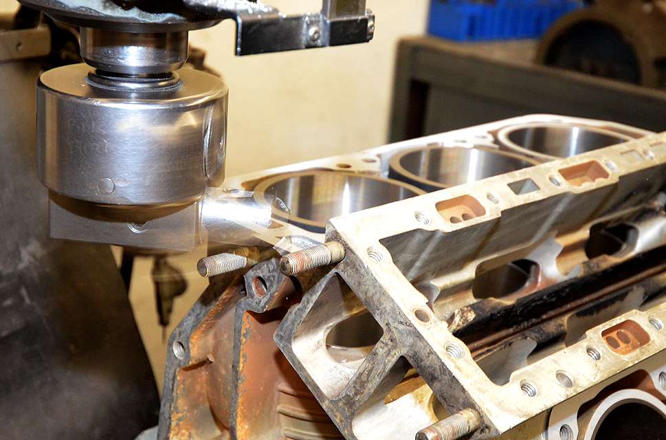 As necessary, all block surfaces are machined with a Bridgeport dry milling machine.