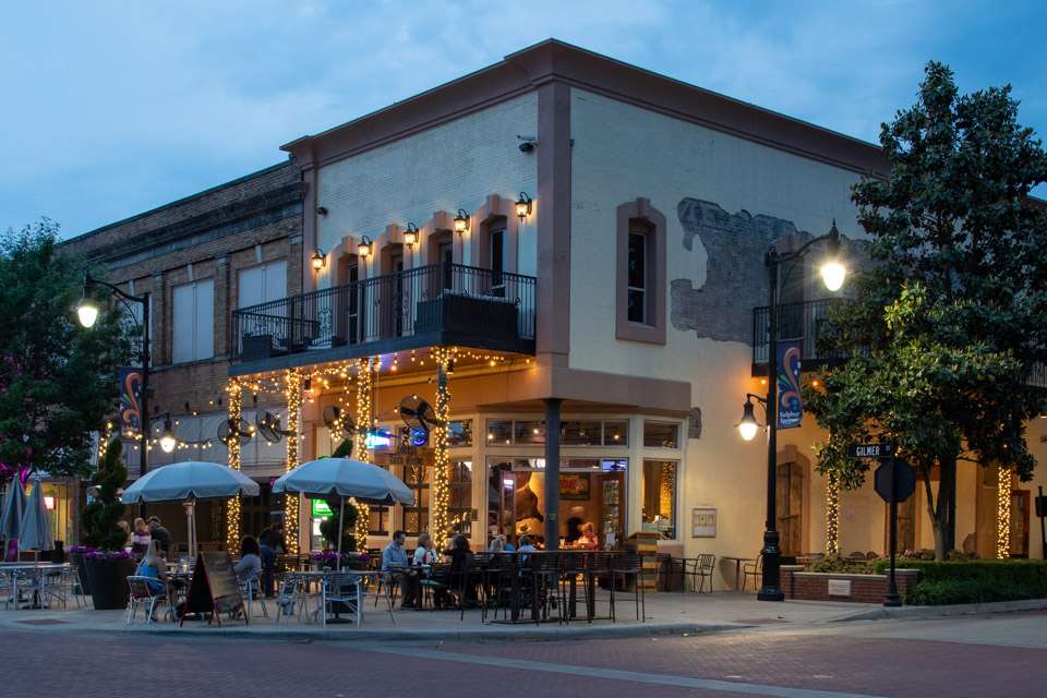 A vibrant downtown night scene includes incredible restaurants like Corner Grub, as well as bars and coffee houses.
