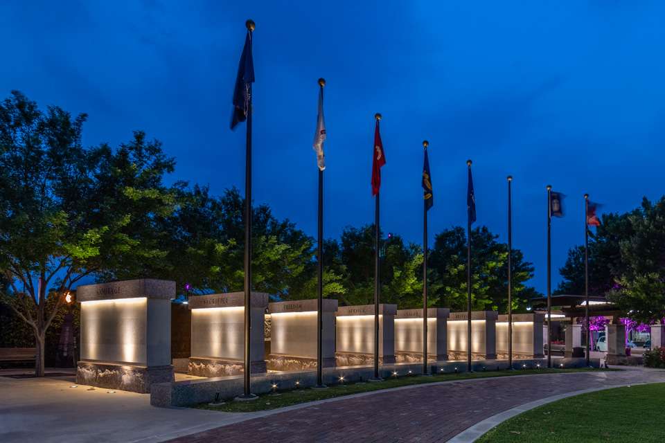 Stone walls are engraved with 2,755 soldiers who gave their lives in the armed services. The walls are topped with the words âCourage,â âSacrifice,â âFreedom,â âService,â âValor,â âRespectâ and âHonor.â
