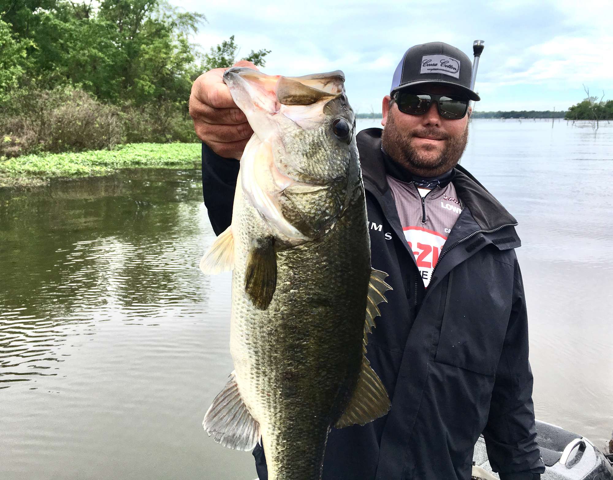 Clent Davis struggled all morning as the shad spawn bite was not cooperating.  After missing almost 10 fish that wouldnât really eat his bait he picked up 2 keepers. His persistence with a swim jig paid off with this nice 6-11 that brought a smile to his face.