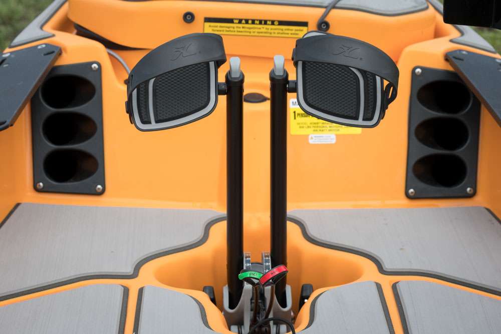 An up-close view of the inside front shows the H-Track system for holding plyers and other tools, the six rod holders, and the MirageDrive 180 system. The pedals on the MiragDrive adjust according to your height, and the two pull levers allow you to switch between forward (green), and reverse (red).     