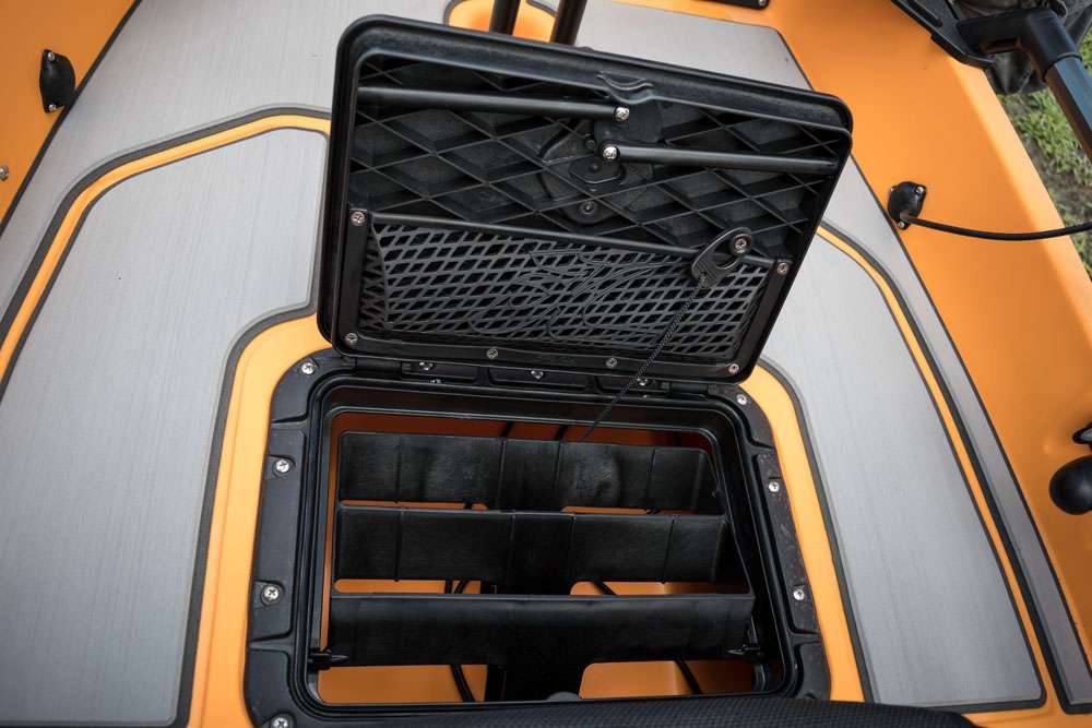 The twist and seal hatch includes a tackle management system for storing boxes of tackle. For extra storage space, the TMS can be removed, revealing a large compartment. 