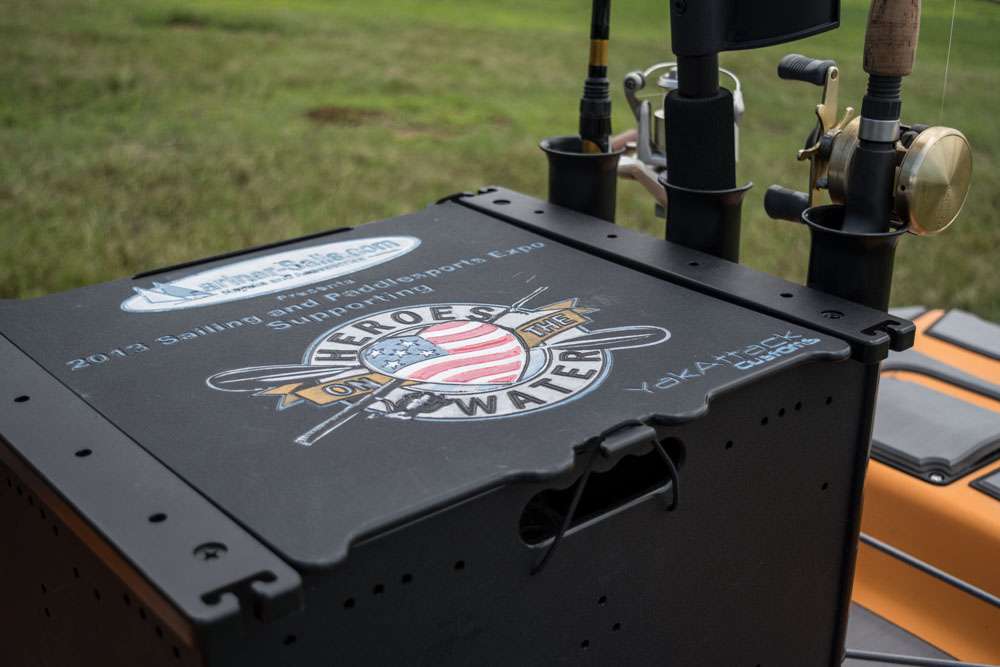 This box is an extra, not included with the Hobe Pro Angler. The tackle box/rod holder was crafted and hand painted by a war veteran, and placed in the rear cargo area of this kayak.