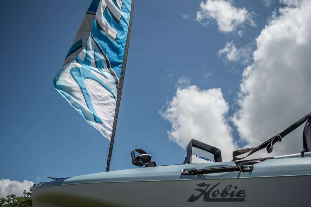 The Vertical accessory tube on the Hobie Mirage Passport is being demonstrated by flying the Hobie flag at Texas Fest. 