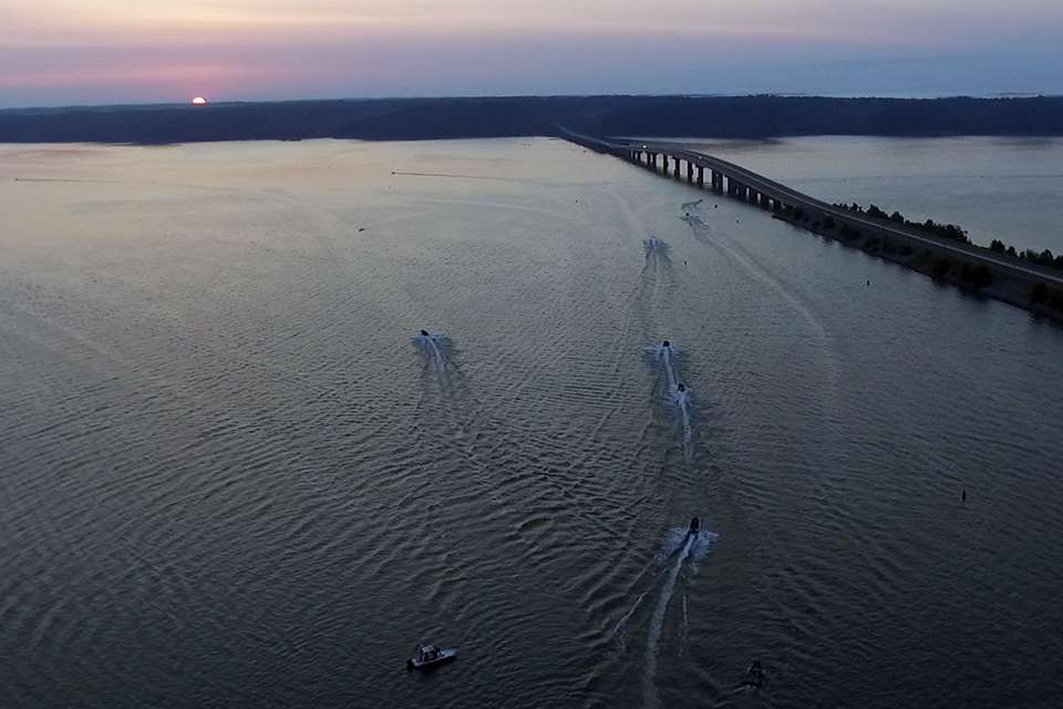 The boats blasted off just before sunrise over Kentucky Lake.