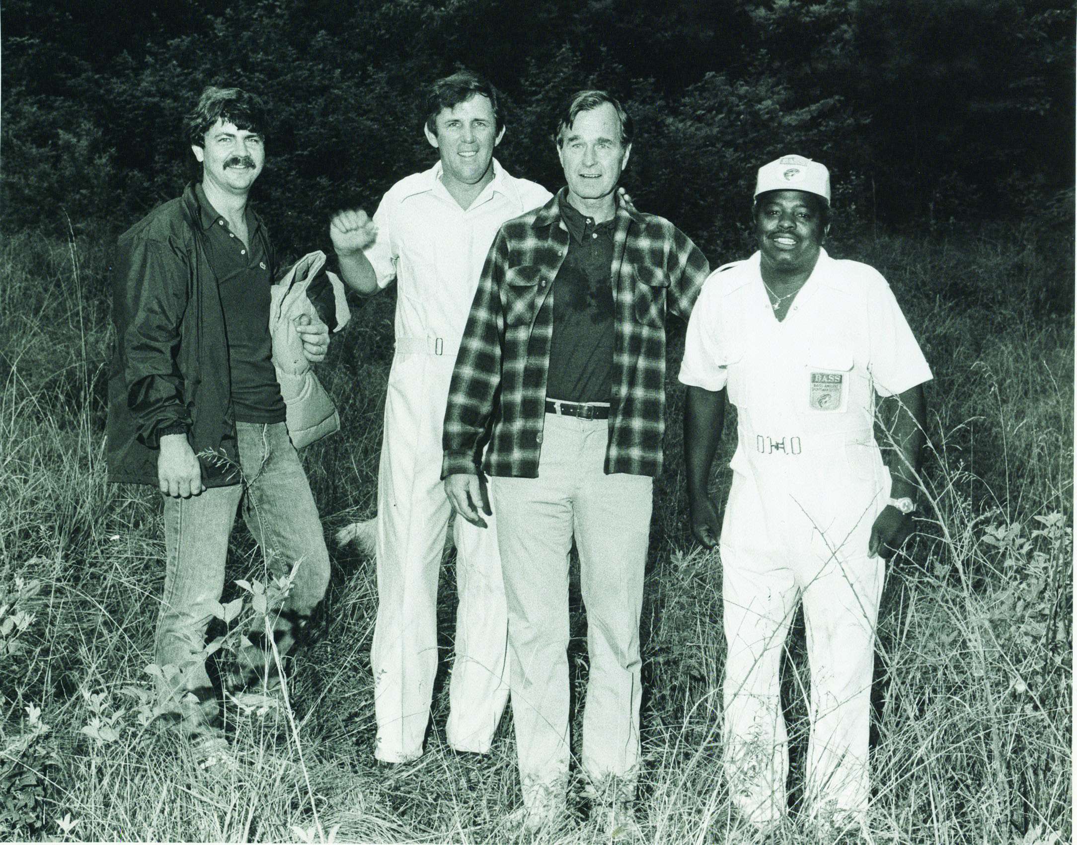 Precht was hired in 1979. He is pictured here (left) with Ray Scott, Pooley Dawson and then-Governor of Texas, George Bush.