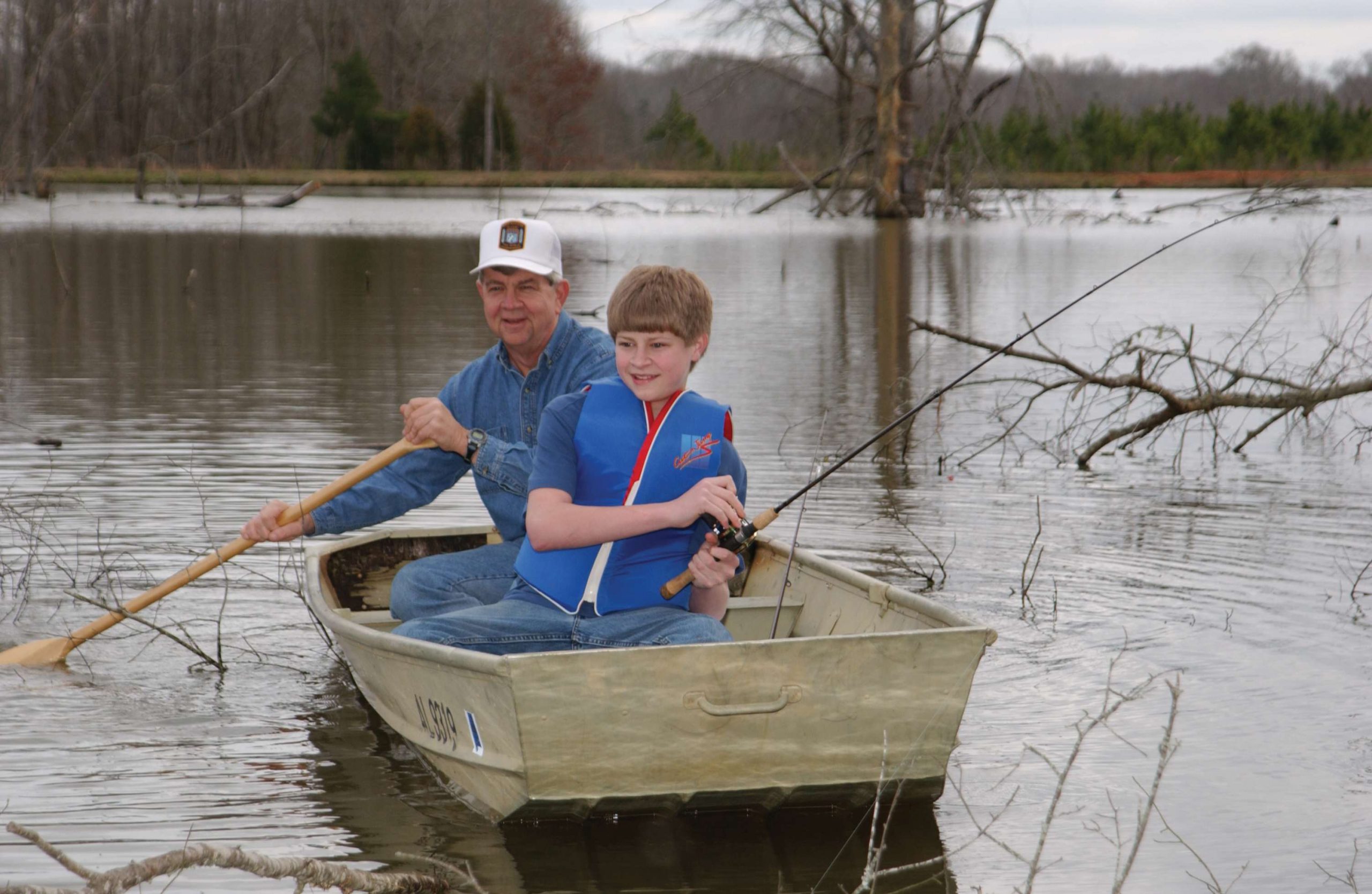 Pictured here with his youngest son, Joseph, the pair were inspiration for the illustration that would appear on the 35th Anniversary cover of Bassmaster.