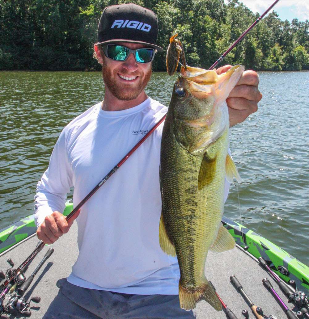 <b>12:21 p.m.</b> A good bass inhales the 1/4-ounce punch bait in a laydown. Shryock sticks the fish and swings aboard his fifth keeper, 3 pounds, 1 ounce. <br>
<b>12:32 p.m.</b> The heat and humidity are oppressive as Shryock punches a small patch of emergent grass. <br>
<b>12:38 p.m.</b> He catches a shorty from a marina slip on the shaky head.
<p>
<b>1 HOUR LEFT</b><br>
<b>12:45 p.m.</b> Shryock rockets back uplake and cranks the 10.5 Dredger around the ditch where he caught his first keeper. The plug comes back with a ball of discarded monofilament. âAt least Iâm cleaning trash out of the lake!â <br>
<b>12:57 p.m.</b> He chunks the drop-shot rig into the ditch and catches a mini-bass.
<b>1:03 p.m.</b> Shryock flips the Magnum shaky head worm into a laydown and catches his sixth keeper, 1 pound even. Itâs no help to his total. <br>
<b>1:17 p.m.</b> Shryock runs back to the point where he caught his fourth keeper and cranks the 10.5.
