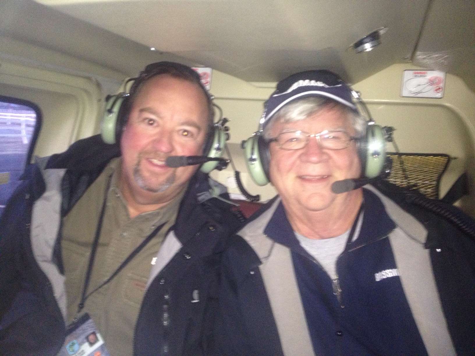 B.A.S.S. CEO Bruce Akin and Precht fly over a Classic venue in a helicopter. 