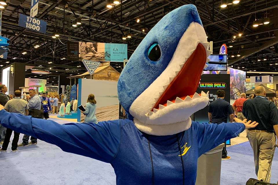 Lila Oast helped Johnson Outdoors Watercraft draw eyes with a cute shark act.