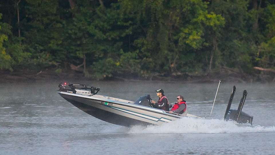 The boats speed off for another day of competition on Virginia's James River.