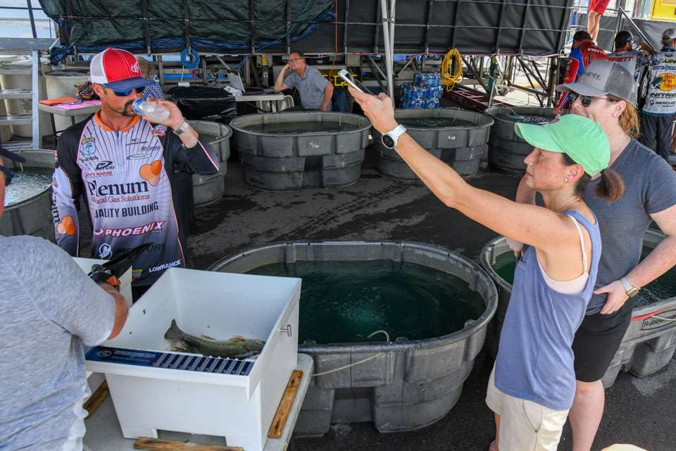 Charlotte Harris, the Partnership Marketing Specialist for Academy Sports + Outdoors snaps a backstage photo. 