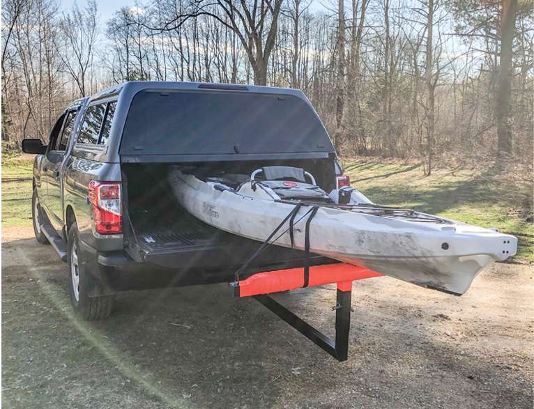Many kayak-tournament anglers feel a truck bed provides the most efficient means of launching and retrieving their boats. A bed extender that fits into the hitch receiver helps trucks with shorter beds securely carry a yak. Easily installed padding using duct tape and a swim noodle helps avert scratches in the plastic watercraft and keep the strapped-down boat from sliding.
<p>
<em>Captions: Dave Mull</em>