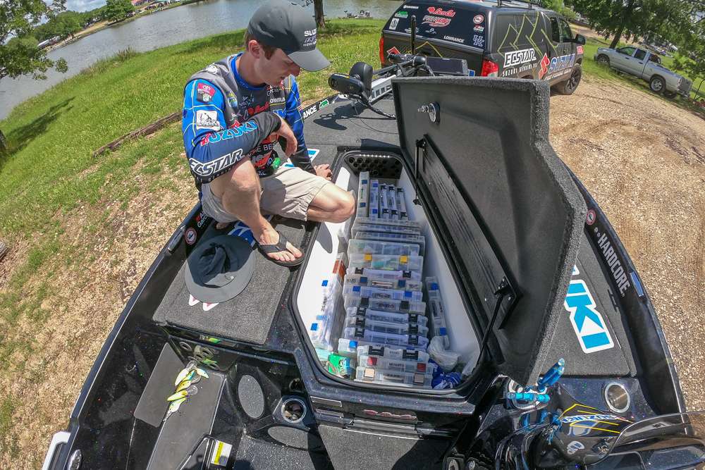 It's on to the large center compartment, which could be for more rods but as you can see he is using it for significant tackle storage. Card is a confessed tackle hoarder, if you can't tell. 