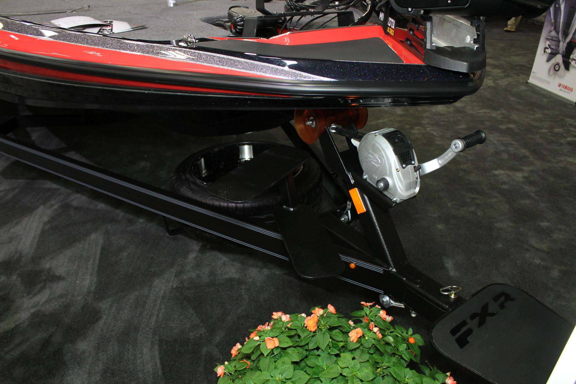 The popular step system on the Skeeter Built trailer with a Fulton Winch and the spare tire mount under the bow.