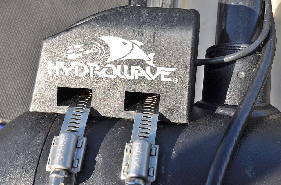 The speaker for a Hydrowave Electronic Feeding Stimulator is clamped to the top of the electric motor.