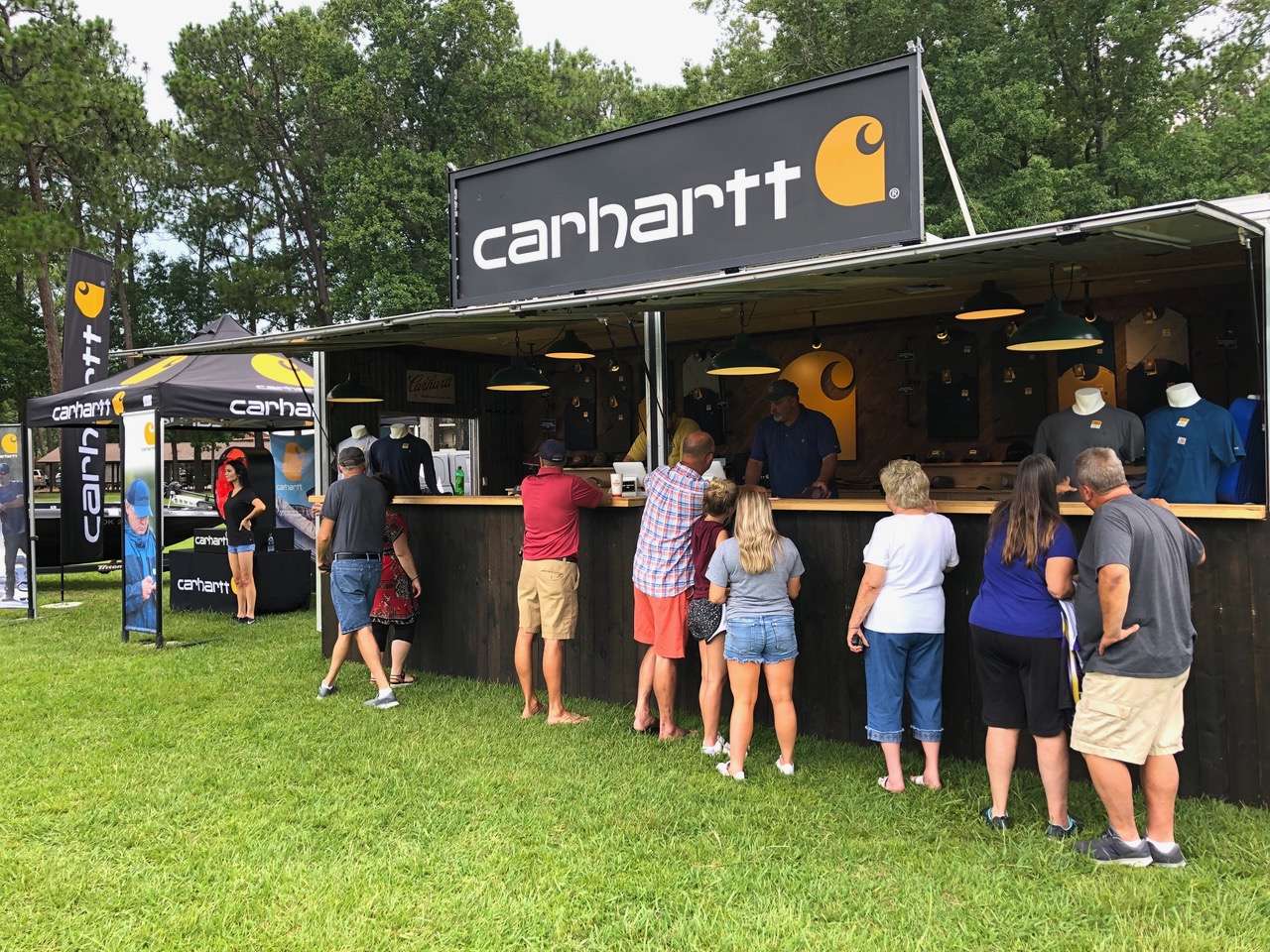 Family, friends, and fans of college anglers bought large numbers of quality, lightweight shirts and cool hats from Tim Wilkins in the Carhartt trailer at weigh-in.
